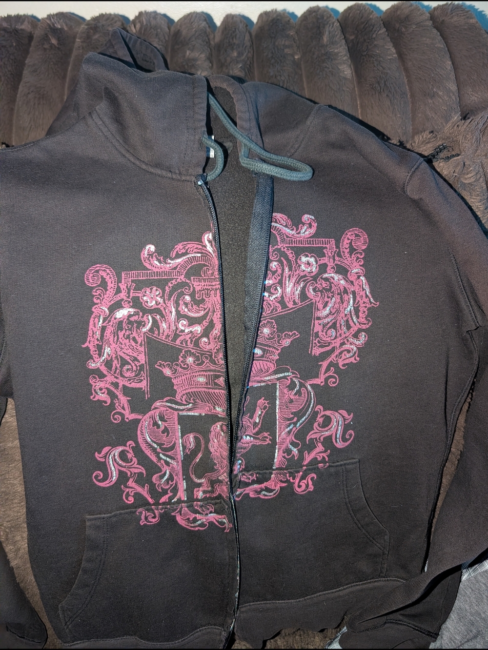 Black Zip-Up Hoodie with Pink Ornate Crest Graphic